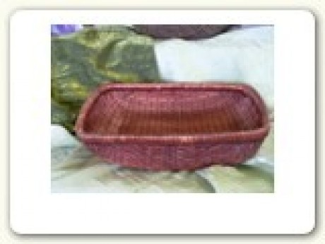 Rattan Basket; red tone w/ curved sides 14